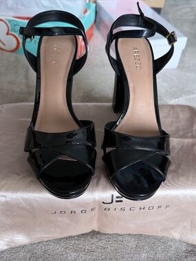 Stunning black platform sandals by AREZZO